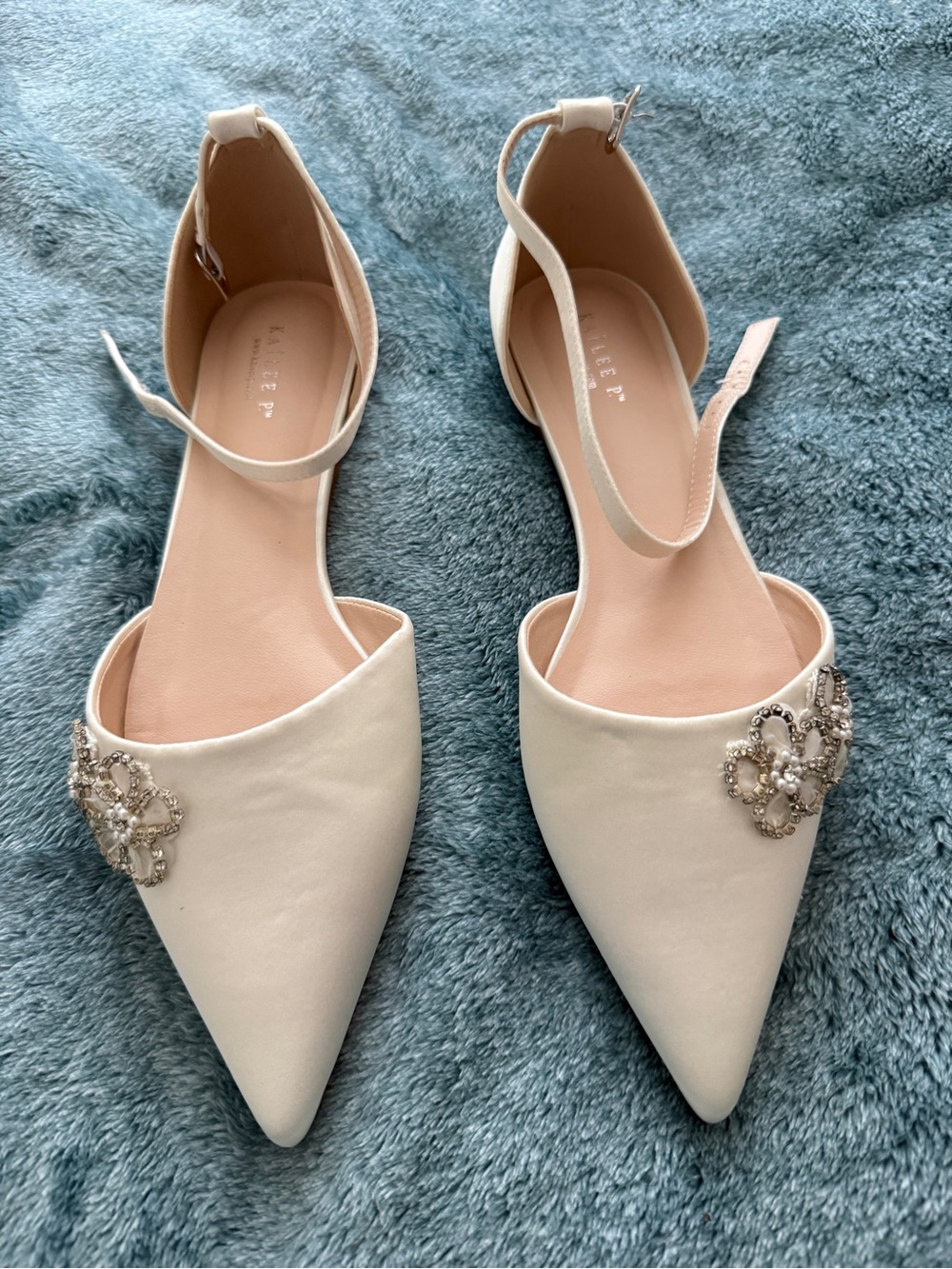 Kailee P Pointed Toe Embellished Ankle-Strap Flats in Ivory